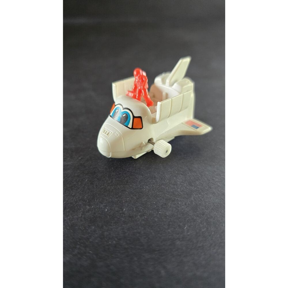 Vintage Mini Space Shuttle Wind Up Toy Red Astronaut Figure Small Plastic USA